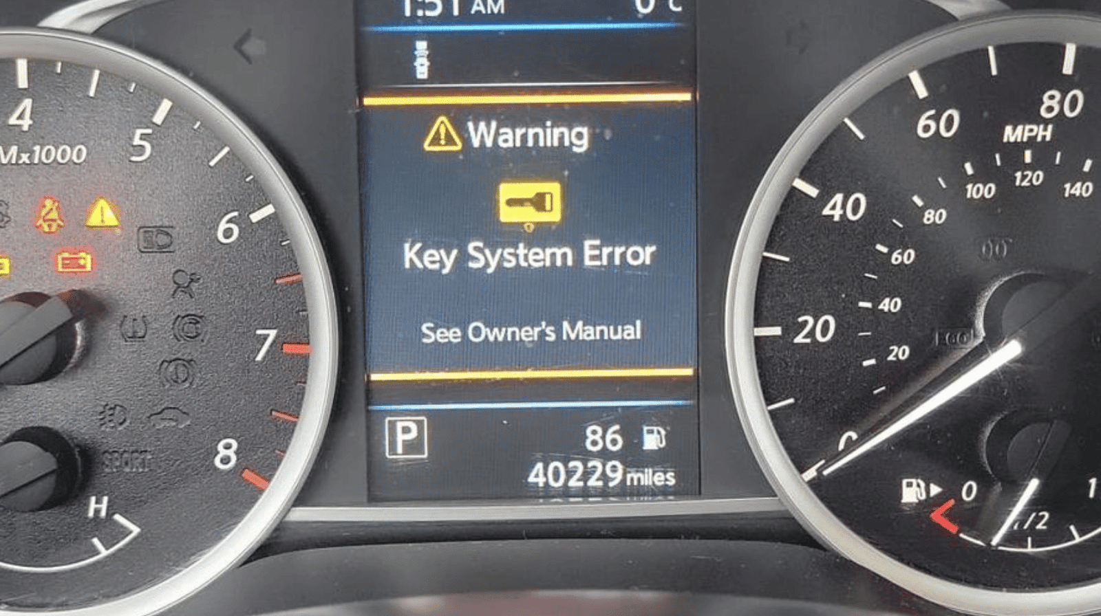 Automotive locksmith services in Beaverton OR – dashboard showing key system error warning light, typical issue needing car key programming or ignition repair.