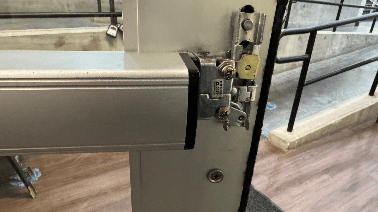 Commercial lock mechanism on a glass door, showcasing business locksmith services in Beaverton, Oregon
